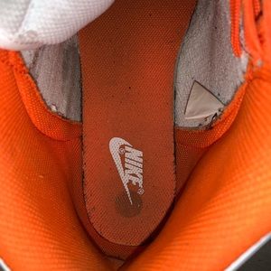 Nike orange and white dunks